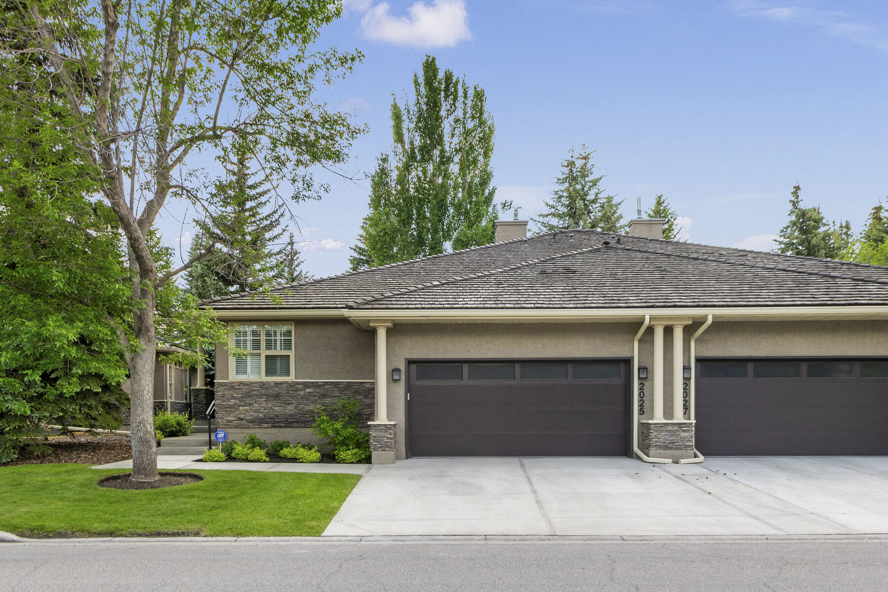 Triple Attached Garage & Driveway
