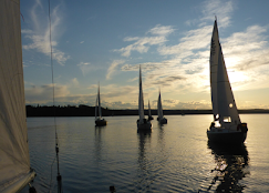 Sailboats at sunset on the Glenmore Reservoir, home of the Glenmore Sailing Club